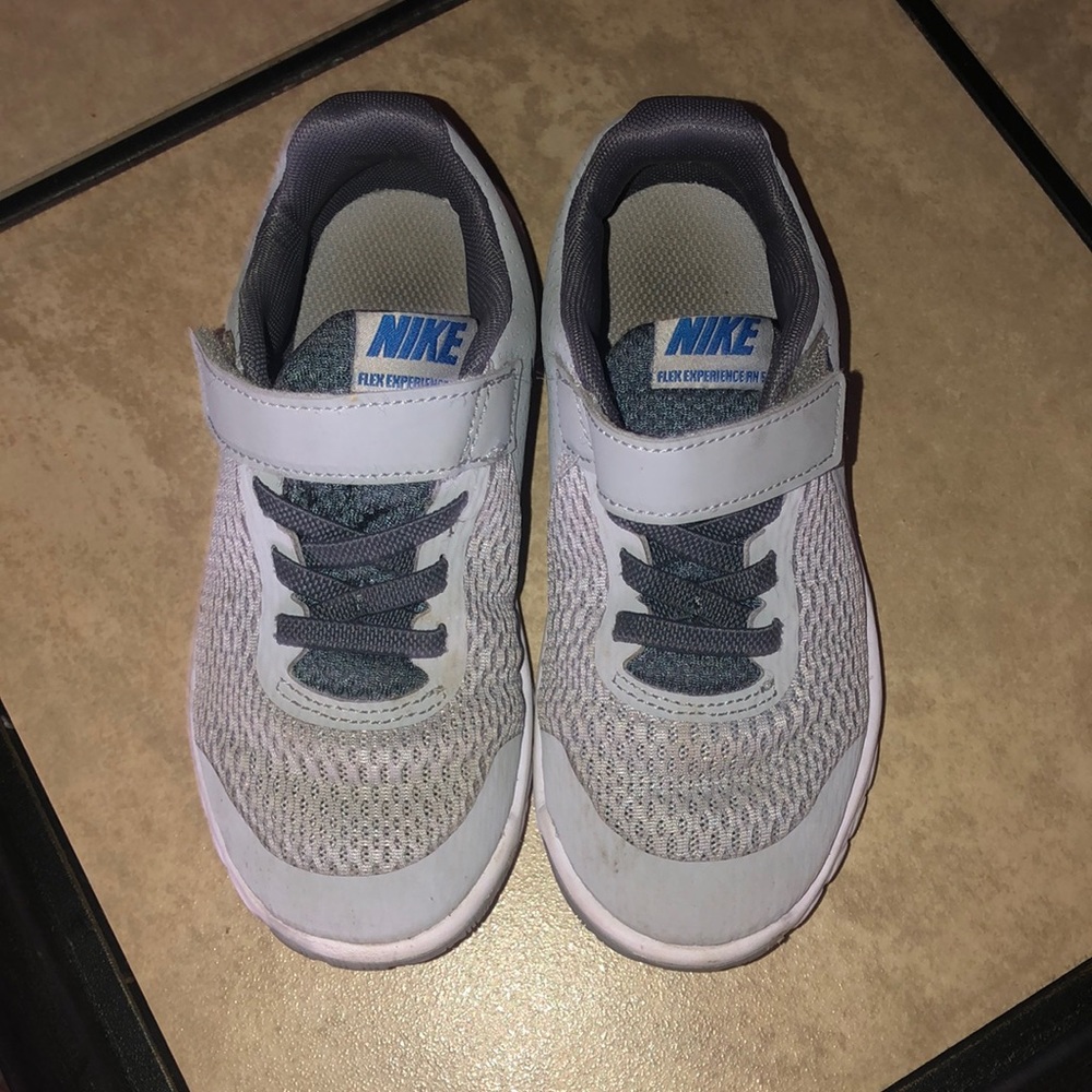 Gray Nike Velcro tennis shoes